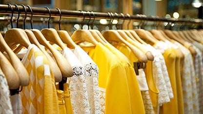 Rack of yellow clothes